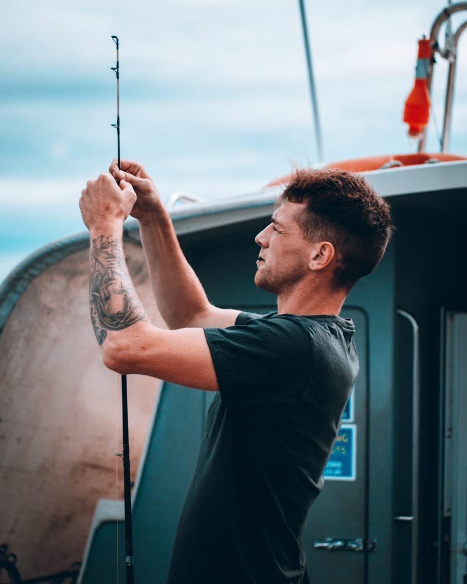 Haydn Ross, skipper of Tuskar 3, rigging up a rod on deck